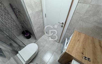 BOSTANLI'DA, YENİ BİNADA, ARA KAT, YENİ EŞYALI KİRALIK 2+1 DAİRE