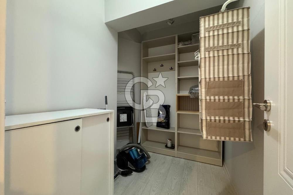 BOSTANLI'DA, YENİ BİNADA, ARA KAT, YENİ EŞYALI KİRALIK 2+1 DAİRE