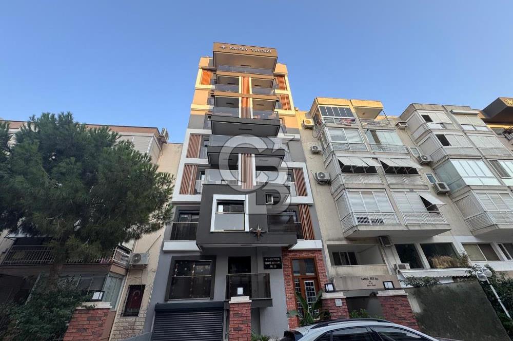 BOSTANLI'DA, YENİ BİNADA, ARA KAT, YENİ EŞYALI KİRALIK 2+1 DAİRE