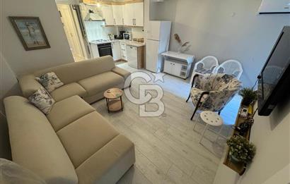 BOSTANLI'DA, YENİ BİNADA, ARA KAT, YENİ EŞYALI KİRALIK 2+1 DAİRE