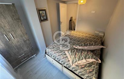 BOSTANLI'DA, YENİ BİNADA, ARA KAT, YENİ EŞYALI KİRALIK 2+1 DAİRE