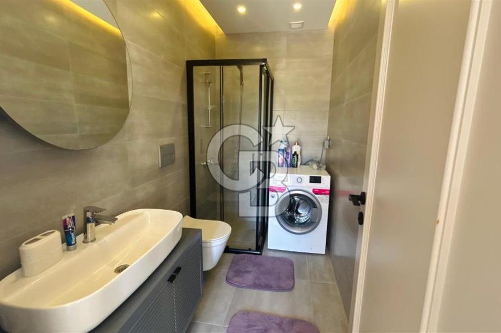 KUŞADASI'NDA SATILIK DENİZ MANZARALI 3+1 TRIPLEKS HAVUZLU VİLLA