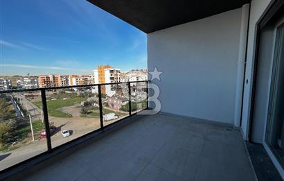 ÇİĞLİ UĞUR MUMCU'DA KAPALI MUTFAKLI 2+1 KİRALIK SIFIR DAİRE