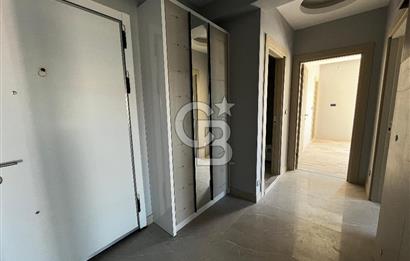 ÇİĞLİ UĞUR MUMCU'DA KAPALI MUTFAKLI 2+1 KİRALIK SIFIR DAİRE