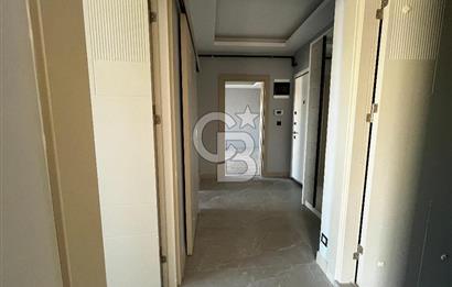 ÇİĞLİ UĞUR MUMCU'DA KAPALI MUTFAKLI 2+1 KİRALIK SIFIR DAİRE