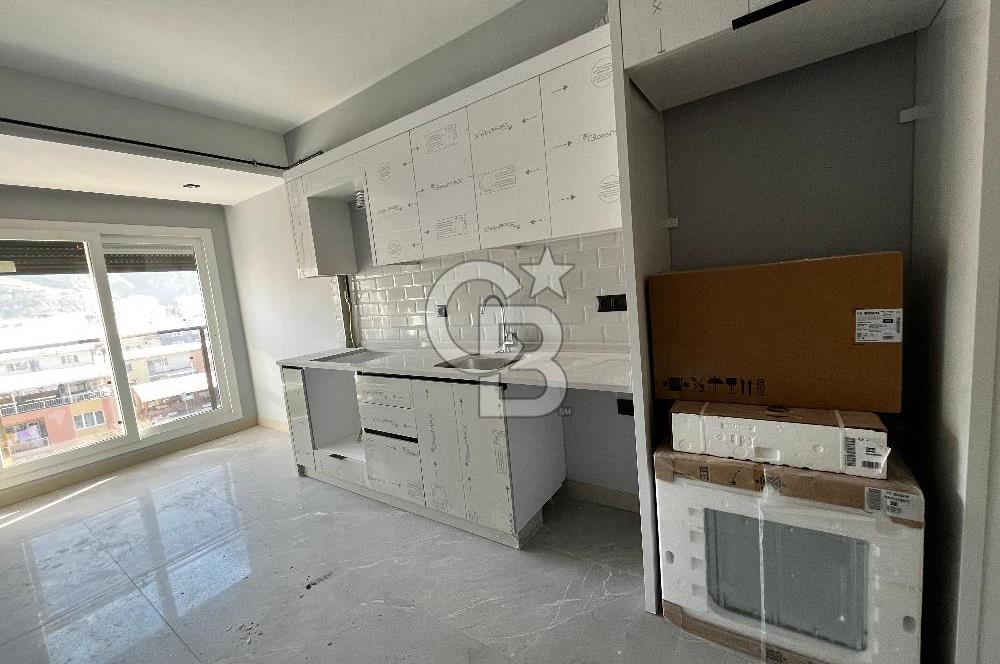 ÇİĞLİ UĞUR MUMCU'DA 2+1 KAPALI MUTFAKLI KİRALIK SIFIR DAİRE