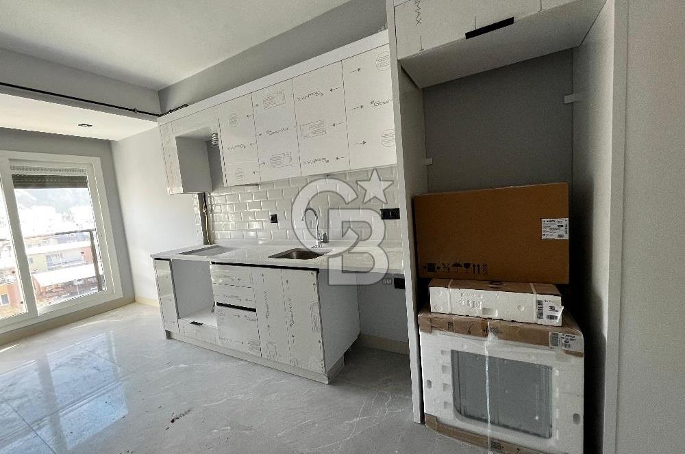 ÇİĞLİ UĞUR MUMCU'DA 2+1 KAPALI MUTFAKLI KİRALIK SIFIR DAİRE