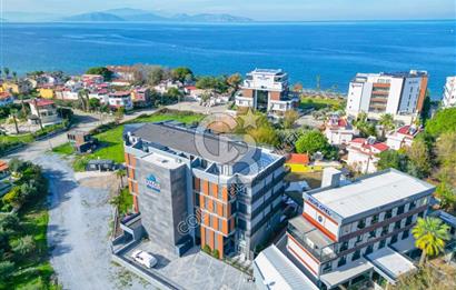 Güzelçamlı Plajına 150 Metre! Deniz Manzaralı Satılık 1+1 Daire