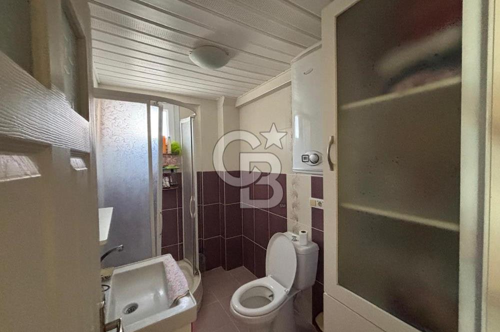 DİKİLİ ÇANDARLI MERKEZDE DENİZE YAKIN SATILIK ÇATI DUBLEKS DAİRE