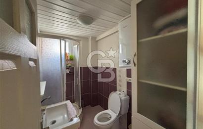 DİKİLİ ÇANDARLI MERKEZDE DENİZE YAKIN SATILIK ÇATI DUBLEKS DAİRE