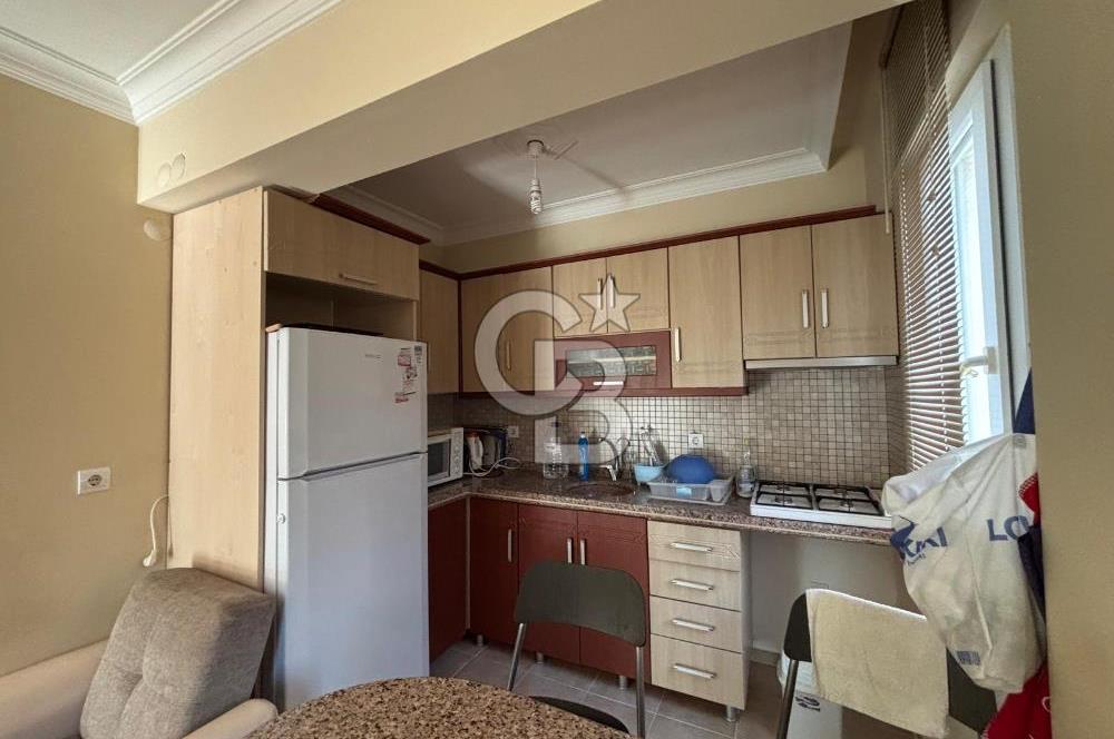 DİKİLİ ÇANDARLI MERKEZDE DENİZE YAKIN SATILIK ÇATI DUBLEKS DAİRE