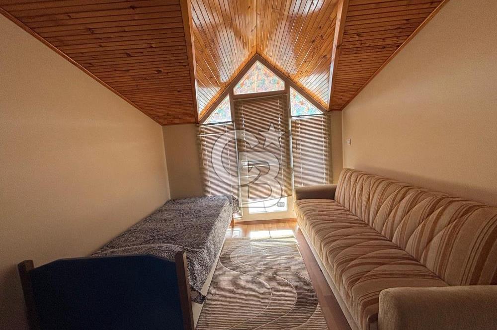 DİKİLİ ÇANDARLI MERKEZDE DENİZE YAKIN SATILIK ÇATI DUBLEKS DAİRE