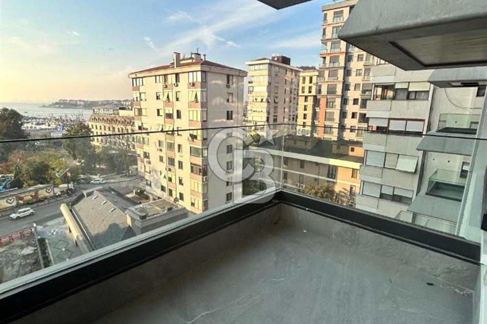 Fener-Kalamış caddesinde deniz manz. balkonlu,sıfır ferah daire