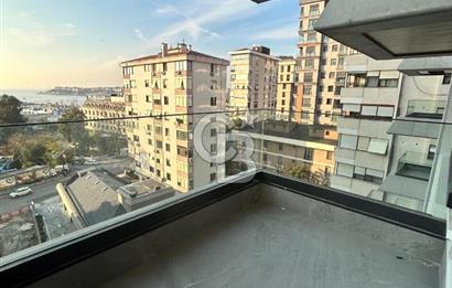 Fener-Kalamış caddesinde deniz manz. balkonlu,sıfır ferah daire