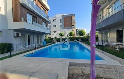 Seyrek'te Havuzlu ve Yeşillikli Site Eşyalı Kiralık 1+1