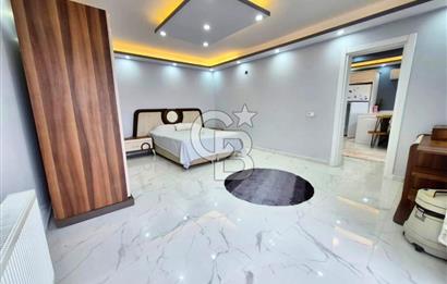 ÇEŞME MUSALLA'DA SATILIK TRİPLEX 10+4 İKİ HAVUZLU İKİZ VİLLA