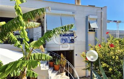 FENER BURNUNDA DENİZ VE ÇEŞME LİMANI MANZARALI 1+1 SATILIK DAİRE