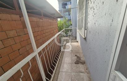 Bayraklı Tepekule Mahallesinde 100 m2 arsa için de 2 kat 2 daire.