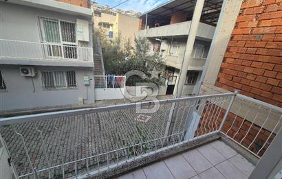 Bayraklı Tepekule Mahallesinde 100 m2 arsa için de 2 kat 2 daire.