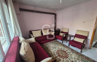 Bayraklı Tepekule Mahallesinde 100 m2 arsa için de 2 kat 2 daire.