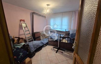 Bayraklı Tepekule Mahallesinde 100 m2 arsa için de 2 kat 2 daire.