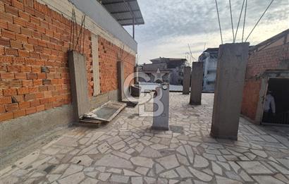 Bayraklı Tepekule Mahallesinde 100 m2 arsa için de 2 kat 2 daire.