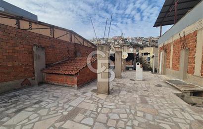 Bayraklı Tepekule Mahallesinde 100 m2 arsa için de 2 kat 2 daire.