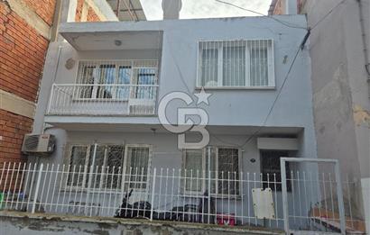 Bayraklı Tepekule Mahallesinde 100 m2 arsa için de 2 kat 2 daire.