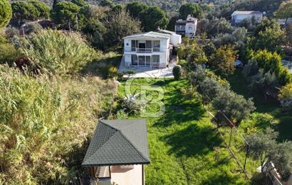 DİKİLİ BADEMLİ'DE DENİZ KENARINDA 1 DÖNÜM HİSSE