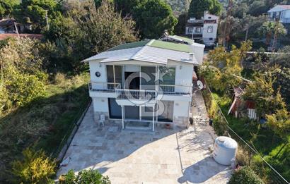 DİKİLİ BADEMLİ'DE DENİZ KENARINDA 1 DÖNÜM HİSSE