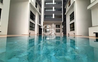 Kıbrıs Girne Karakum Akacan Cruise Sitesinde Satılık Havuz Manzaralı 2+1 Daire