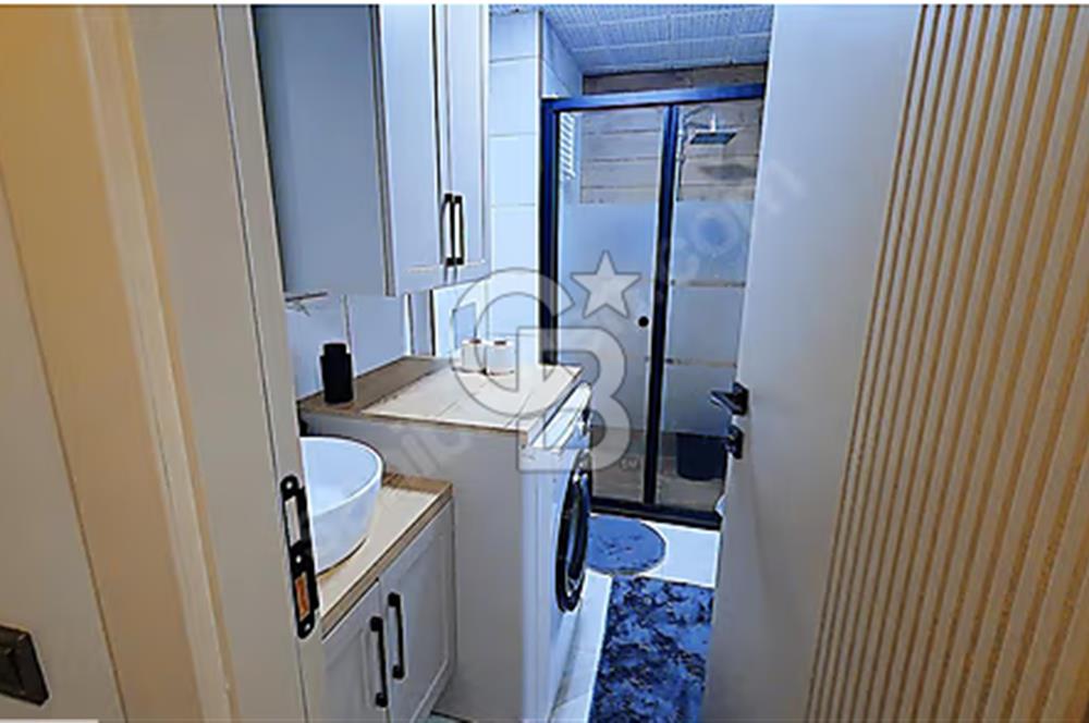 İncek mahallesinde full mobilyalı merkezi konumda 1+1 daire