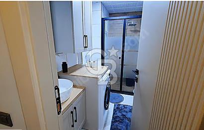 İncek mahallesinde full mobilyalı merkezi konumda 1+1 daire