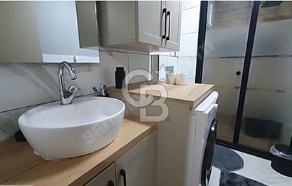 İncek mahallesinde full mobilyalı merkezi konumda 1+1 daire