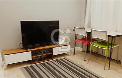 İncek mahallesinde full mobilyalı merkezi konumda 1+1 daire
