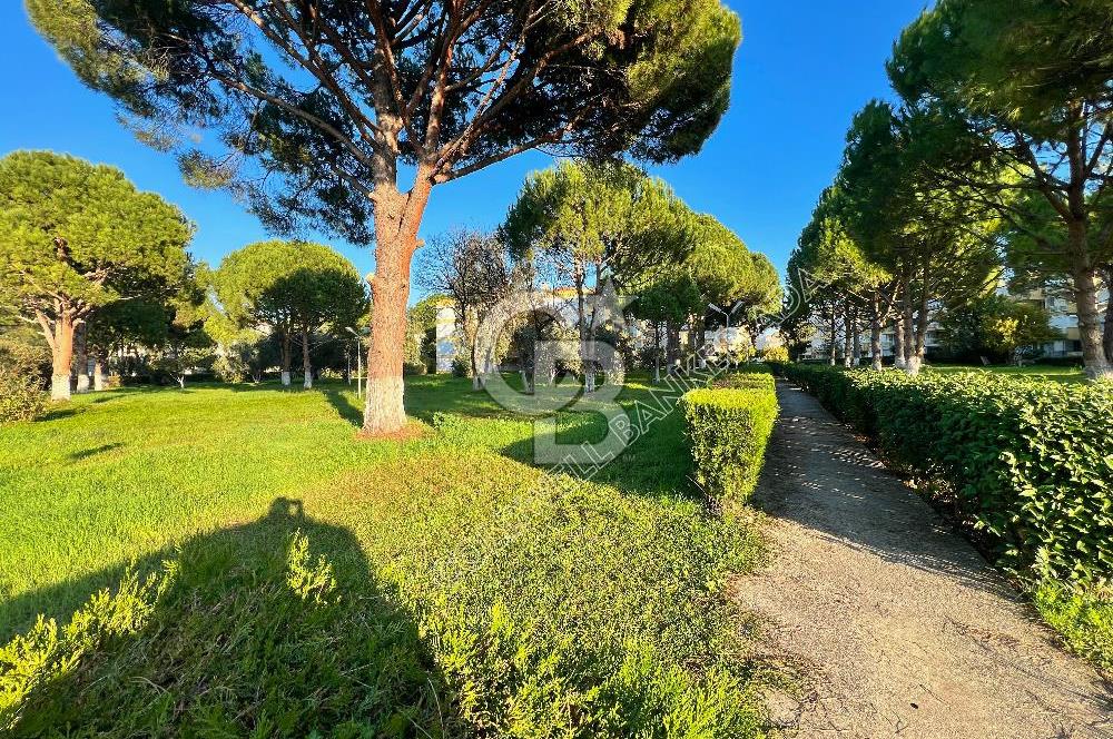 KUŞADASI DAVUTLAR SAHİL SİTESİNDE  BAHÇELİ 2+1  DAİRE