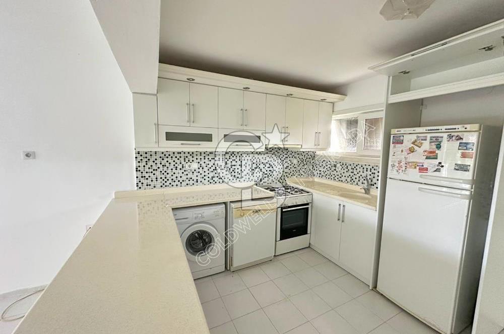 KUŞADASI DAVUTLAR SAHİL SİTESİNDE  BAHÇELİ 2+1  DAİRE