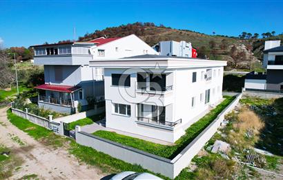 ÇANDARLI'DA BAHÇELİ VERANDALI GENİŞ 2+1 DAİRE