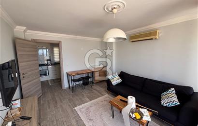 ÇANDARLI'DA DENİZ MANZARALI VE BAHÇELİ GENİŞ 1+1 DAİRE