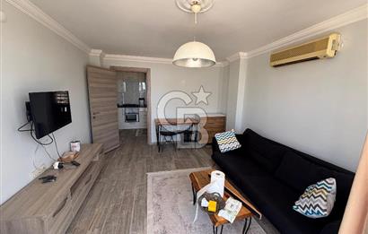 ÇANDARLI'DA DENİZ MANZARALI VE BAHÇELİ GENİŞ 1+1 DAİRE