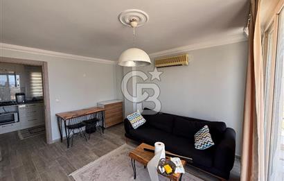 ÇANDARLI'DA DENİZ MANZARALI VE BAHÇELİ GENİŞ 1+1 DAİRE