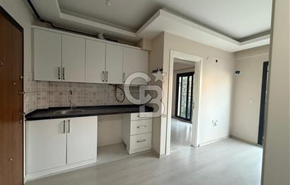 BAYRAKLI DA İZBANA YAKIN YENİ BİNADA ARA KAT SATILIK 1+1 DAİRE 
