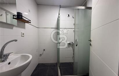 BAYRAKLI DA İZBANA YAKIN YENİ BİNADA ARA KAT SATILIK 1+1 DAİRE 