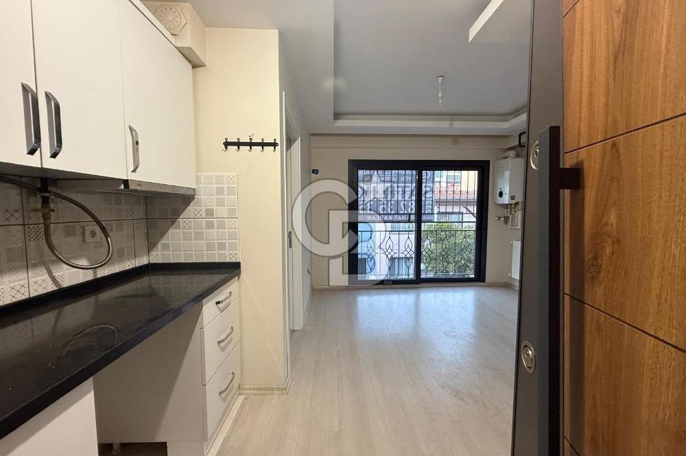 BAYRAKLI DA İZBANA YAKIN YENİ BİNADA ARA KAT SATILIK 1+1 DAİRE 