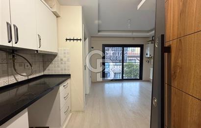 BAYRAKLI DA İZBANA YAKIN YENİ BİNADA ARA KAT SATILIK 1+1 DAİRE 