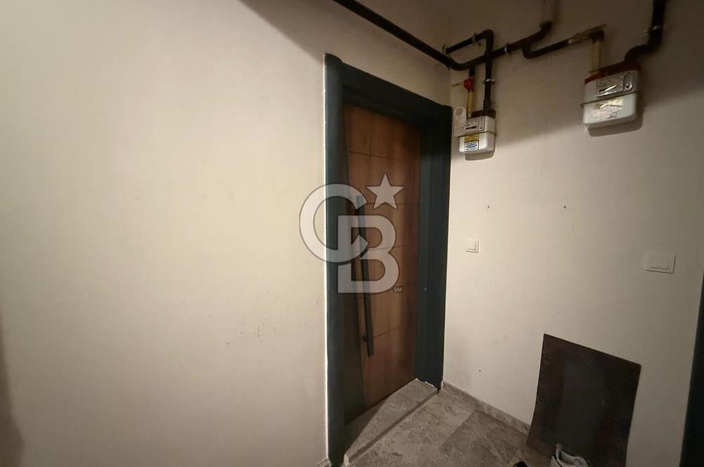 BAYRAKLI DA İZBANA YAKIN YENİ BİNADA ARA KAT SATILIK 1+1 DAİRE 