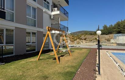 AYDIN KUŞADASI'NDA SİTE DE HAVUZLU 1+1 DAİRE
