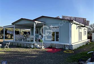 FOÇA FEVZİ ÇAKMAK MEVKİSİNDE ÜZERİNDE 2+1 PREFABRİK EV VE TARLA - 5 - 324132