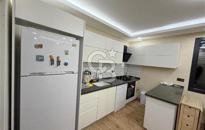 Didim Cumhuriyet'te merkezi konumda 2+1 Bahçe katı Satılık Daire