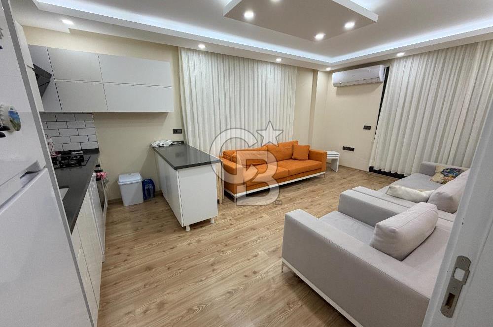 Didim Cumhuriyet'te merkezi konumda 2+1 Bahçe katı Satılık Daire